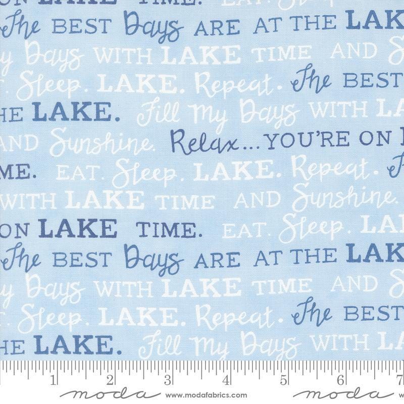 Image of the On Lake Time Words Sky Blue quilting cotton fabric by Deb Strain for Moda Fabrics. Features paddles on a blue background. Cute Little Fabric Shop