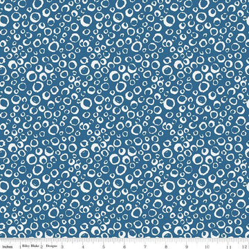 Image of the Ocean Oasis Bubbles Ocean quilting cotton fabric by Diane Labombarbe for Riley Blake Designs. Features bubbles on a blue background. Cute Little Fabric Shop
