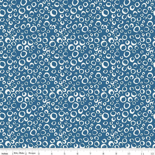 Image of the Ocean Oasis Bubbles Ocean quilting cotton fabric by Diane Labombarbe for Riley Blake Designs. Features bubbles on a blue background. Cute Little Fabric Shop