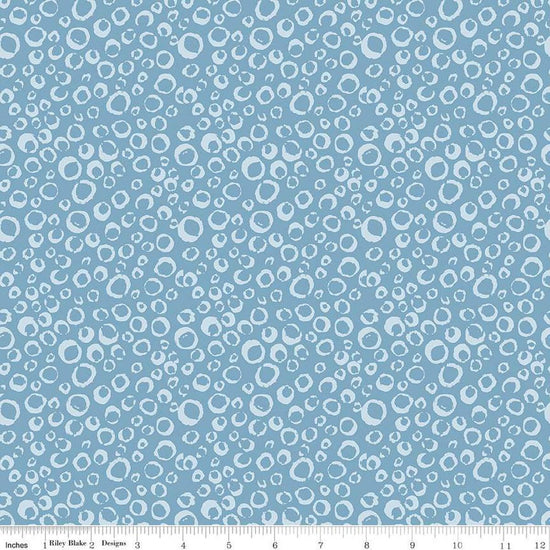 Image of the Ocean Oasis Bubbles Stone quilting cotton fabric by Diane Labombarbe for Riley Blake Designs. Features bubbles on a blue background. Cute Little Fabric Shop