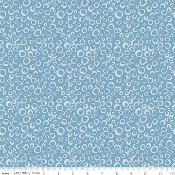 Image of the Ocean Oasis Bubbles Stone quilting cotton fabric by Diane Labombarbe for Riley Blake Designs. Features bubbles on a blue background. Cute Little Fabric Shop