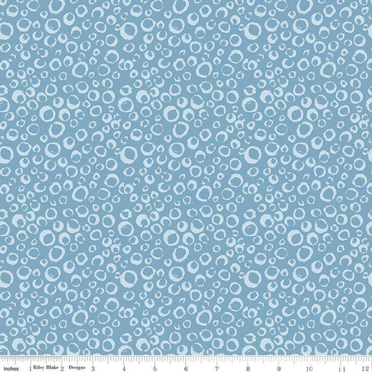 Image of the Ocean Oasis Bubbles Stone quilting cotton fabric by Diane Labombarbe for Riley Blake Designs. Features bubbles on a blue background. Cute Little Fabric Shop