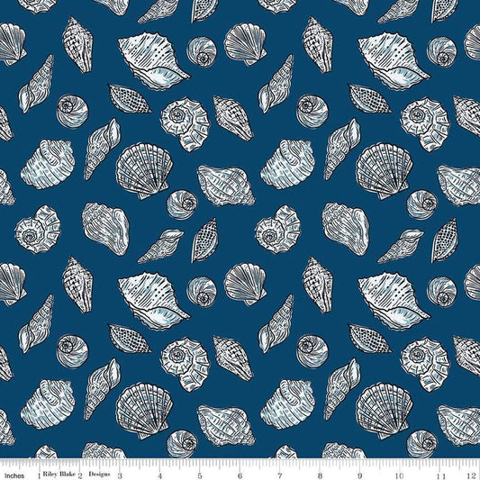 Image of the Ocean Oasis Seashells Night quilting cotton fabric by Diane Labombarbe for Riley Blake Designs. Features shells on a blue background. Cute Little Fabric Shop