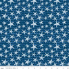 Image of the Ocean Oasis Starfish Night quilting cotton fabric by Diane Labombarbe for Riley Blake Designs. Features starfish on a blue background. Cute Little Fabric Shop