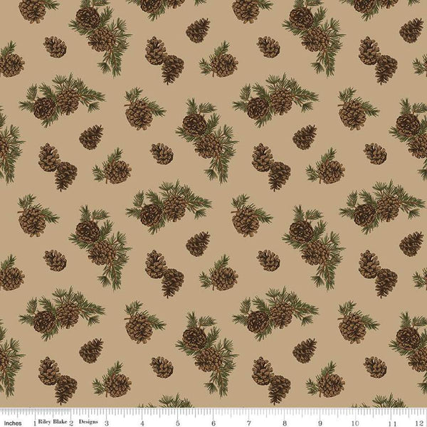 Image of the Pine Grove Pinecones Tan quilting cotton fabric by Riley Blake Designs. Features trees on a brown background. Cute Little Fabric Shop