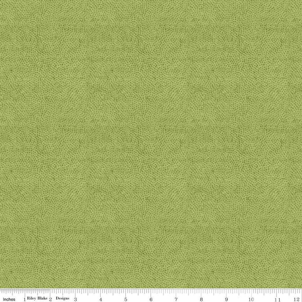 Image of the Sewing Seeds III Stipple Green quilting cotton fabric by Lori Holt for Riley Blake Designs. Features dots on a green background. Cute Little Fabric Shop