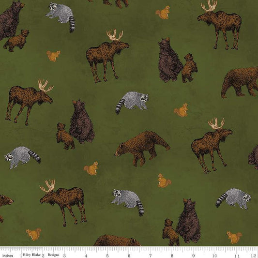 Image of the Pine Grove Animal Toss Green quilting cotton fabric by Riley Blake Designs. Features animals on a green background. Cute Little Fabric Shop
