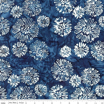Image of the Wide Back Expressions Batiks Let Freedom Reign Moody Blues fabric by Riley Blake Designs. Features fireworks on a blue background. 
Cute Little Fabric Shop