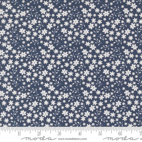 Image of the Raspberry Summer Blossoms Blueberry quilting cotton fabric by Sherri & Chelsi for Moda Fabrics. Features flowers on a blue background. Cute Little Fabric Shop