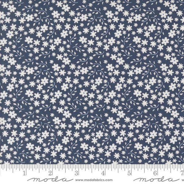 Image of the Raspberry Summer Blossoms Blueberry quilting cotton fabric by Sherri & Chelsi for Moda Fabrics. Features flowers on a blue background. Cute Little Fabric Shop