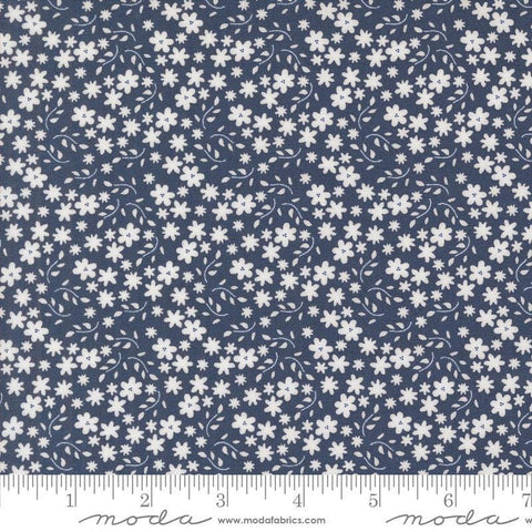 Image of the Raspberry Summer Blossoms Blueberry quilting cotton fabric by Sherri & Chelsi for Moda Fabrics. Features flowers on a blue background. Cute Little Fabric Shop