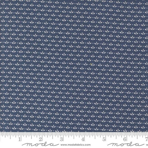 Image of the Raspberry Summer Sprout Blueberry quilting cotton fabric by Sherri & Chelsi for Moda Fabrics. Features leaves on a blue background. Cute Little Fabric Shop