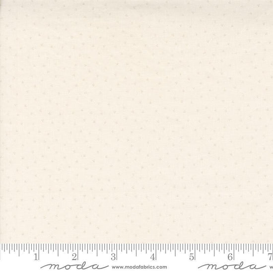 Image of the Itty Bitty Background Gatherings Dot Porcelain quilting cotton fabric by Moda Fabrics. Features dots on a white background. Cute Little Fabric Shop