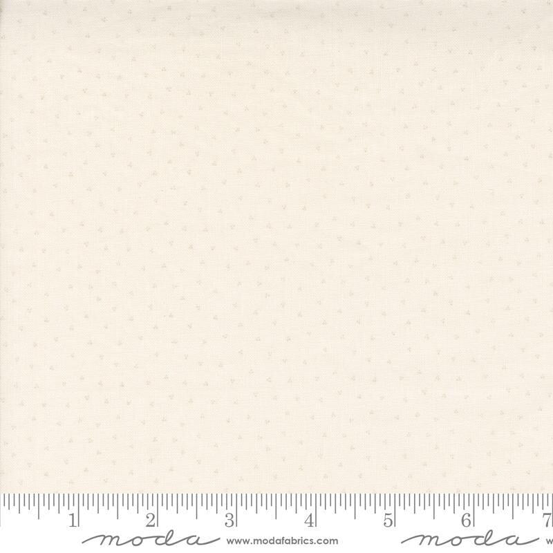 Image of the Itty Bitty Background Gatherings Dot Porcelain quilting cotton fabric by Moda Fabrics. Features dots on a white background. Cute Little Fabric Shop