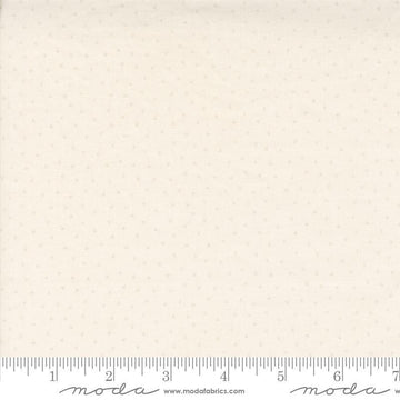 Image of the Itty Bitty Background Gatherings Dot Porcelain quilting cotton fabric by Moda Fabrics. Features dots on a white background. Cute Little Fabric Shop