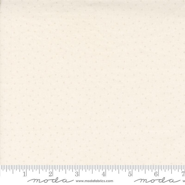 Image of the Itty Bitty Background Gatherings Dot Porcelain quilting cotton fabric by Moda Fabrics. Features dots on a white background. Cute Little Fabric Shop