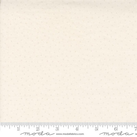 Image of the Itty Bitty Background Gatherings Dot Porcelain quilting cotton fabric by Moda Fabrics. Features dots on a white background. Cute Little Fabric Shop