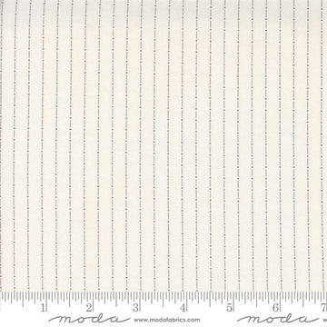 Image of the Itty Bitty Background Gatherings Dotted Grey quilting cotton fabric by Moda Fabrics. Features dotted lines on a grey background. Cute Little Fabric Shop