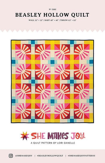 Image of the Beasley Hollow Quilt quilt pattern by She Makes Joy for Moda Fabrics. Features a quilt with many different patterned blocks.
Cute Little Fabric Shop