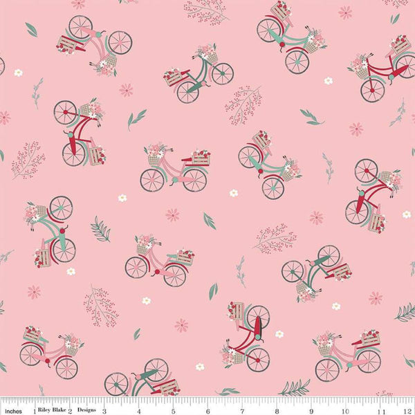 Image of the Berry Market Bicycles Frosting quilting cotton fabric by Beverly McCullough for Riley Blake Designs. Features bikes on a pink background. Cute Little Fabric Shop