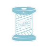 Image of the Quilty™ Tools Spool Binding Holder by Riley Blake Designs. Features an acrylic thread spool. 
Cute Little Fabric Shop