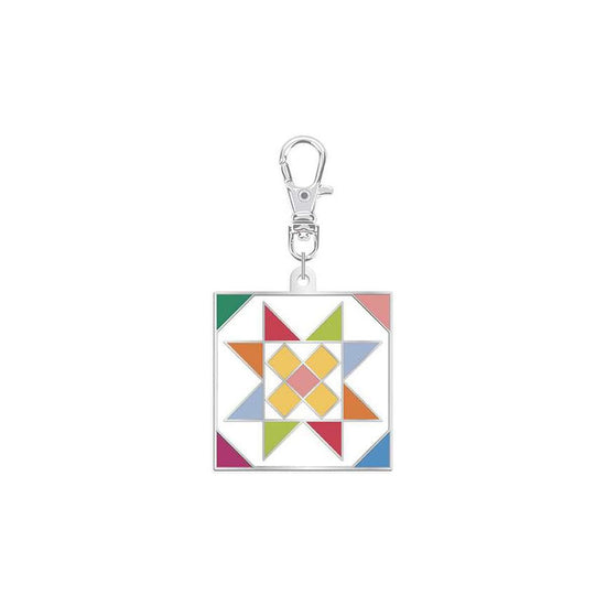 Image of the Riley Blake Designs Star Quilty™ Charm for Riley Blake Designs. Features a star on a charm. 
Cute Little Fabric Shop