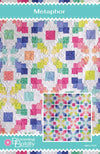 Image of the Blooming Boldly Designs Metaphor Quilt Pattern by Riley Blake Designs. Features a batik quilt pattern. 
Cute Little Fabric Shop
