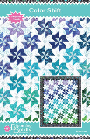 Image of the Color Shift Designs Metaphor Quilt Pattern by Riley Blake Designs. Features a batik quilt pattern. 
Cute Little Fabric Shop