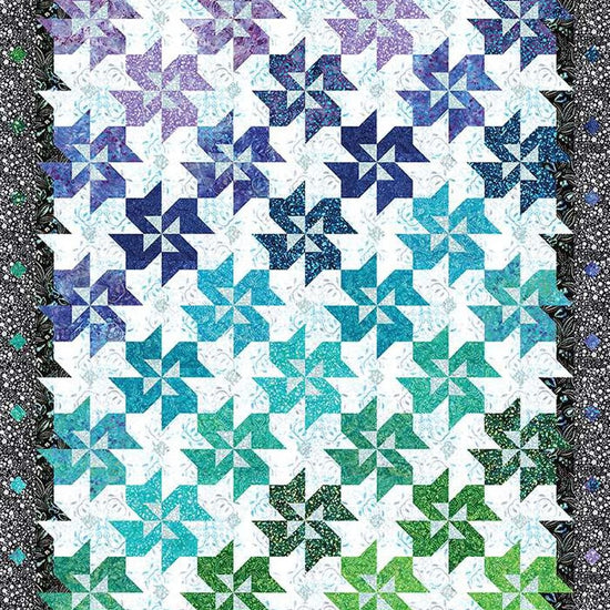 Image of the Color Shift Designs Metaphor Quilt Pattern by Riley Blake Designs. Features a batik quilt pattern. 
Cute Little Fabric Shop