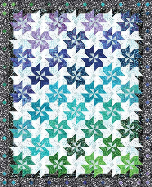 Image of the Color Shift Designs Metaphor Quilt Pattern by Riley Blake Designs. Features a batik quilt pattern. 
Cute Little Fabric Shop