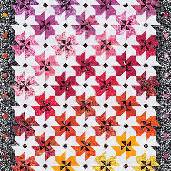 Image of the Color Shift Designs Metaphor Quilt Pattern by Riley Blake Designs. Features a batik quilt pattern. 
Cute Little Fabric Shop
