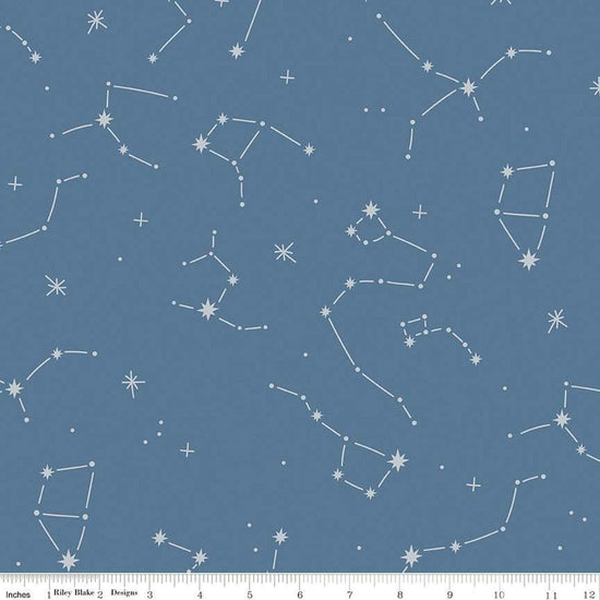 Image of the Hoist the Sails Constellation Denim quilting cotton fabric by Rachel Erickson for Riley Blake Designs. Features stars on a blue background. 
Cute Little Fabric Shop
