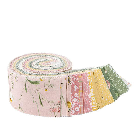 Image of the Love Me More rolie polie by Lisa Audit for Riley Blake Designs. Features floral fabrics. 
Cute Little Fabric Shop