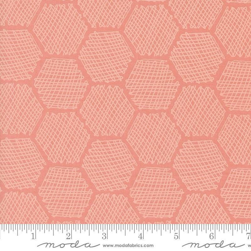 Image of the Bee Garden Honeycomb Carnation quilting cotton fabric by Gingiber for Riley Blake Designs. Features honeycomb on a pink background. Cute Little Fabric Shop