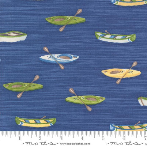 Image of the On Lake Time Canoes Deep Water quilting cotton fabric by Deb Strain for Moda Fabrics. Features canoes on a blue background. Cute Little Fabric Shop