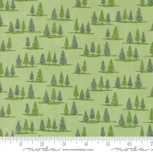 Image of the On Lake Time Trees Spring quilting cotton fabric by Deb Strain for Moda Fabrics. Features trees on a green background. Cute Little Fabric Shop