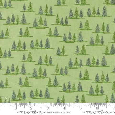 Image of the On Lake Time Trees Spring quilting cotton fabric by Deb Strain for Moda Fabrics. Features trees on a green background. Cute Little Fabric Shop