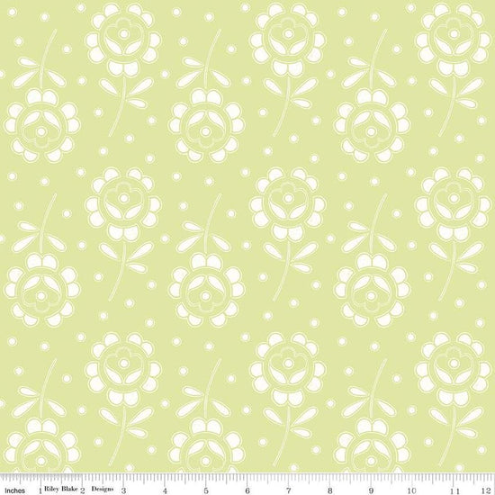Image of the Sewing Seeds III Rose Cutwork Green quilting cotton fabric by Lori Holt for Riley Blake Designs. Features flowers on a green background. Cute Little Fabric Shop