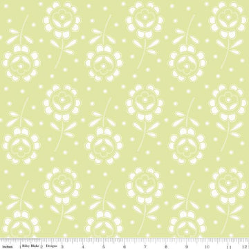 Image of the Sewing Seeds III Rose Cutwork Green quilting cotton fabric by Lori Holt for Riley Blake Designs. Features flowers on a green background. Cute Little Fabric Shop