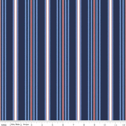 Image of the Yacht Club Stripe Navy quilting cotton fabric by Amanda Niederhauser for Riley Blake Designs. Features stripes on a blue background. Cute Little Fabric Shop