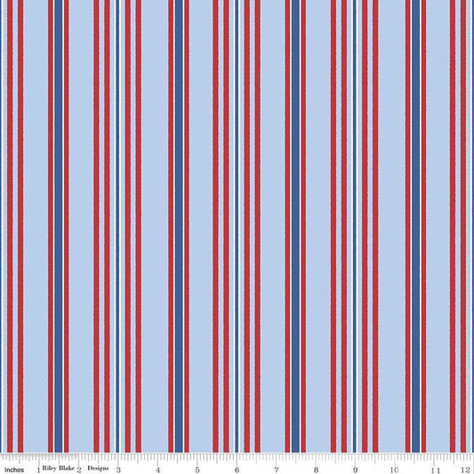 Image of the Yacht Club Stripe Blue quilting cotton fabric by Amanda Niederhauser for Riley Blake Designs. Features stripes on a blue background. Cute Little Fabric Shop