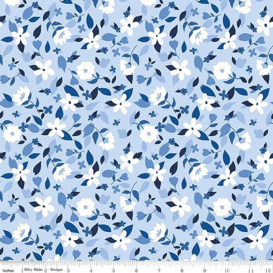 Image of the Yacht Club Flowers Sky quilting cotton fabric by Amanda Niederhauser for Riley Blake Designs. Features flowers on a blue background. Cute Little Fabric Shop