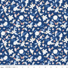 Image of the Yacht Club Flowers Blue quilting cotton fabric by Amanda Niederhauser for Riley Blake Designs. Features flowers on a blue background. Cute Little Fabric Shop