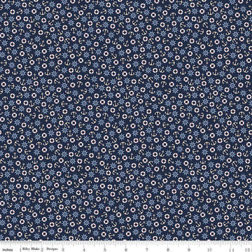 Image of the Yacht Club Toss Navy quilting cotton fabric by Amanda Niederhauser for Riley Blake Designs. Features boat symbols on a blue background. Cute Little Fabric Shop