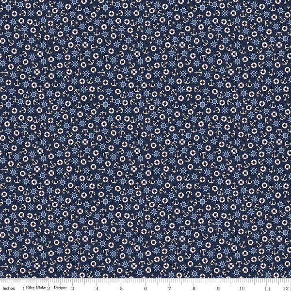 Image of the Yacht Club Toss Navy quilting cotton fabric by Amanda Niederhauser for Riley Blake Designs. Features boat symbols on a blue background. Cute Little Fabric Shop