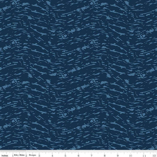 Image of the Ocean Oasis Waves Navy quilting cotton fabric by Diane Labombarbe for Riley Blake Designs. Features waves on a blue background. Cute Little Fabric Shop