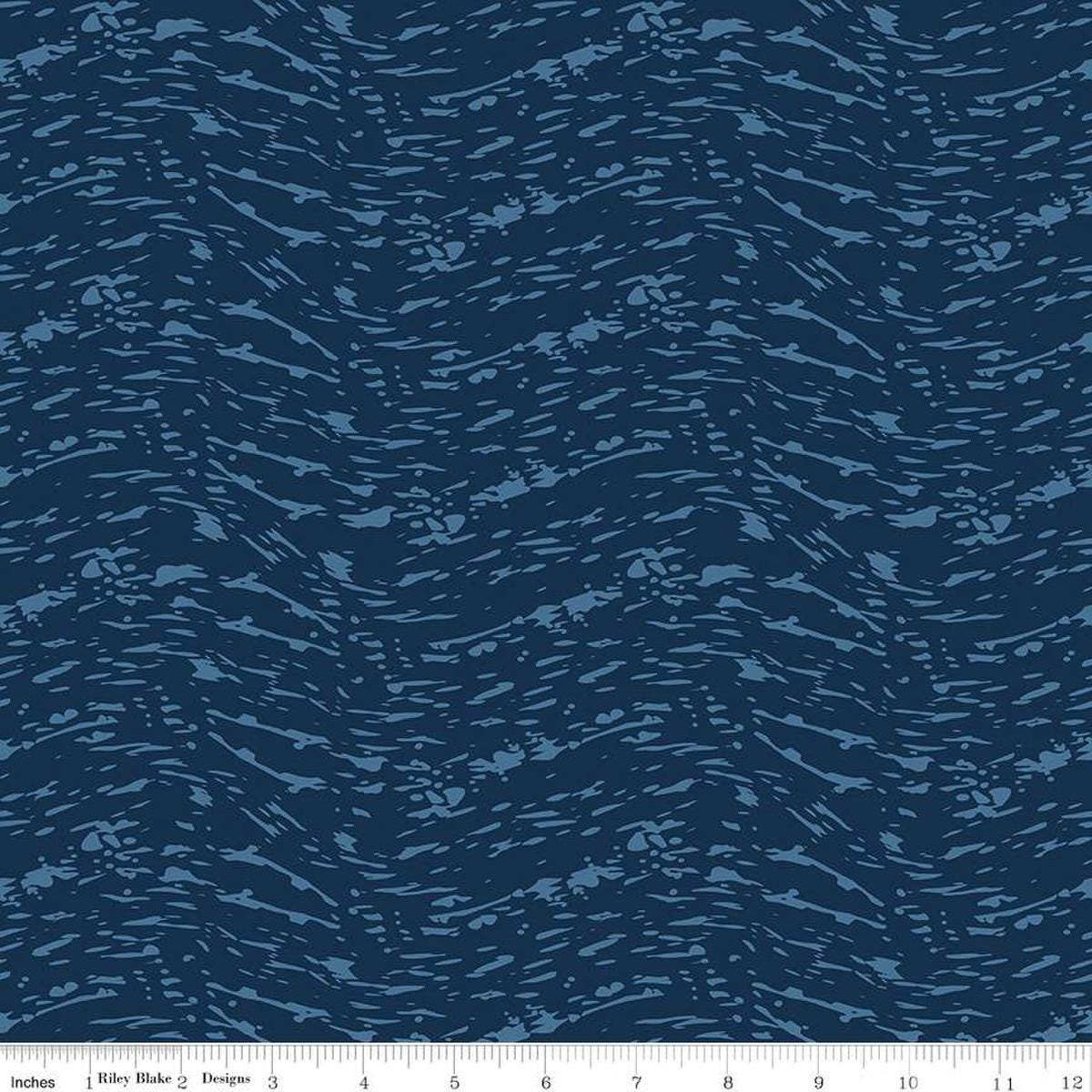 Image of the Ocean Oasis Waves Navy quilting cotton fabric by Diane Labombarbe for Riley Blake Designs. Features waves on a blue background. Cute Little Fabric Shop