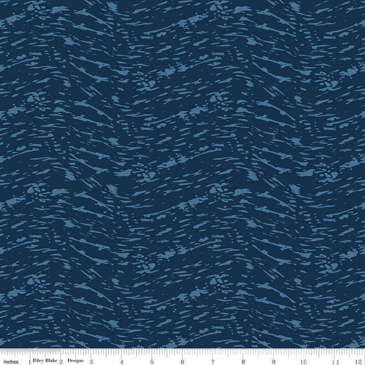 Image of the Ocean Oasis Waves Navy quilting cotton fabric by Diane Labombarbe for Riley Blake Designs. Features waves on a blue background. Cute Little Fabric Shop