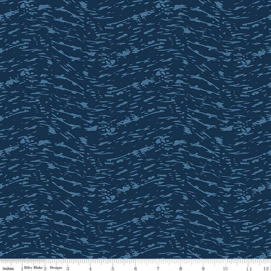 Image of the Ocean Oasis Waves Navy quilting cotton fabric by Diane Labombarbe for Riley Blake Designs. Features waves on a blue background. Cute Little Fabric Shop