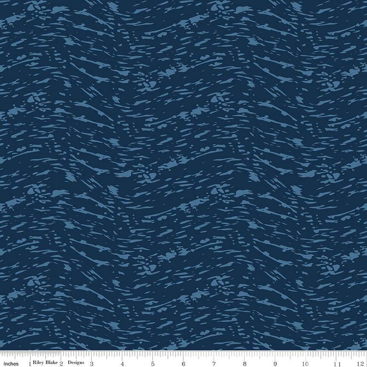 Image of the Ocean Oasis Waves Navy quilting cotton fabric by Diane Labombarbe for Riley Blake Designs. Features waves on a blue background. Cute Little Fabric Shop